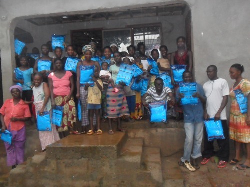 mosquito bed net recipients - free from malaria