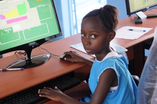 Josephine at Develop Africa's computer lab at FAWE school