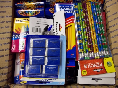 Box with assorted school supplies