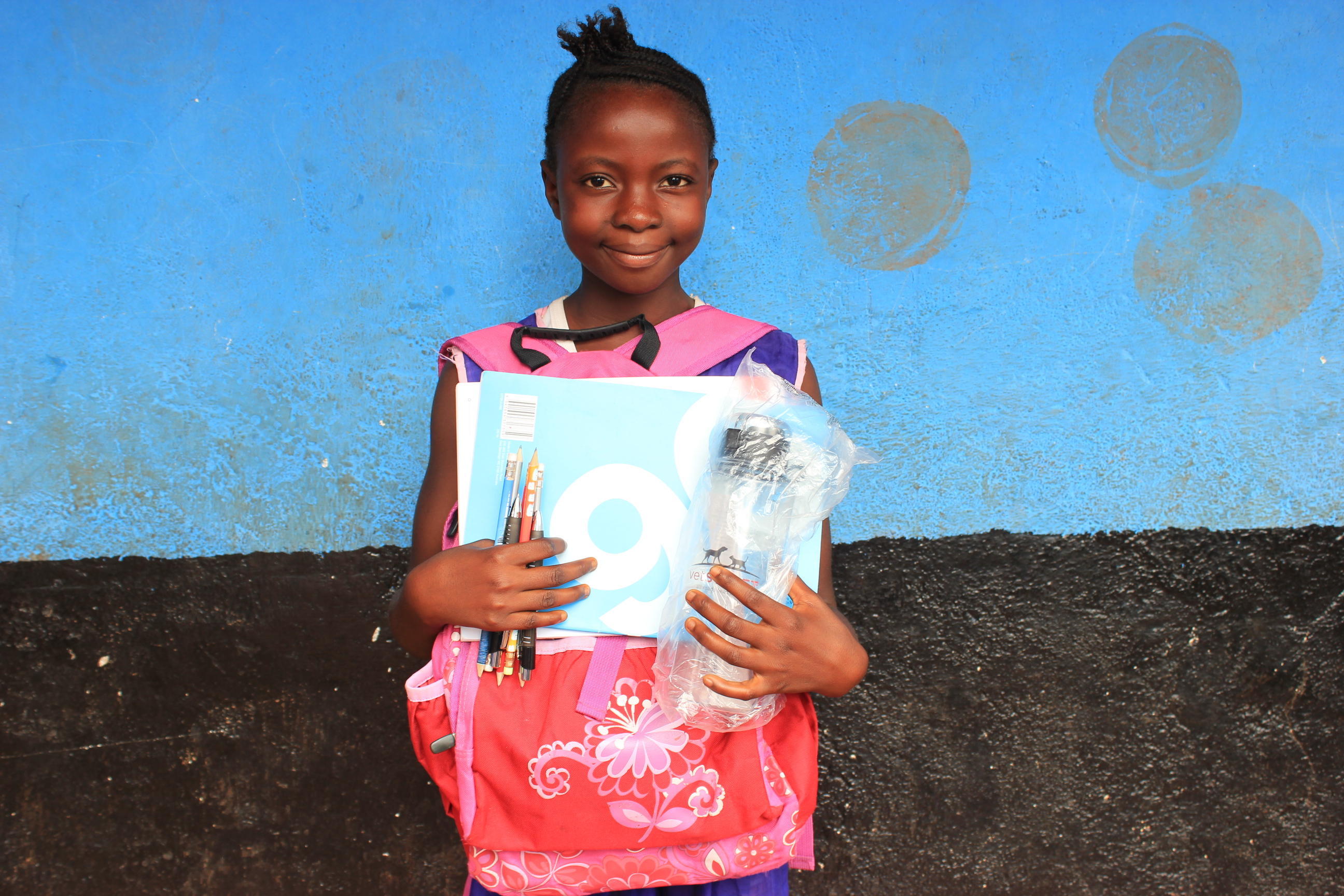 School girl thankful for school supplies 