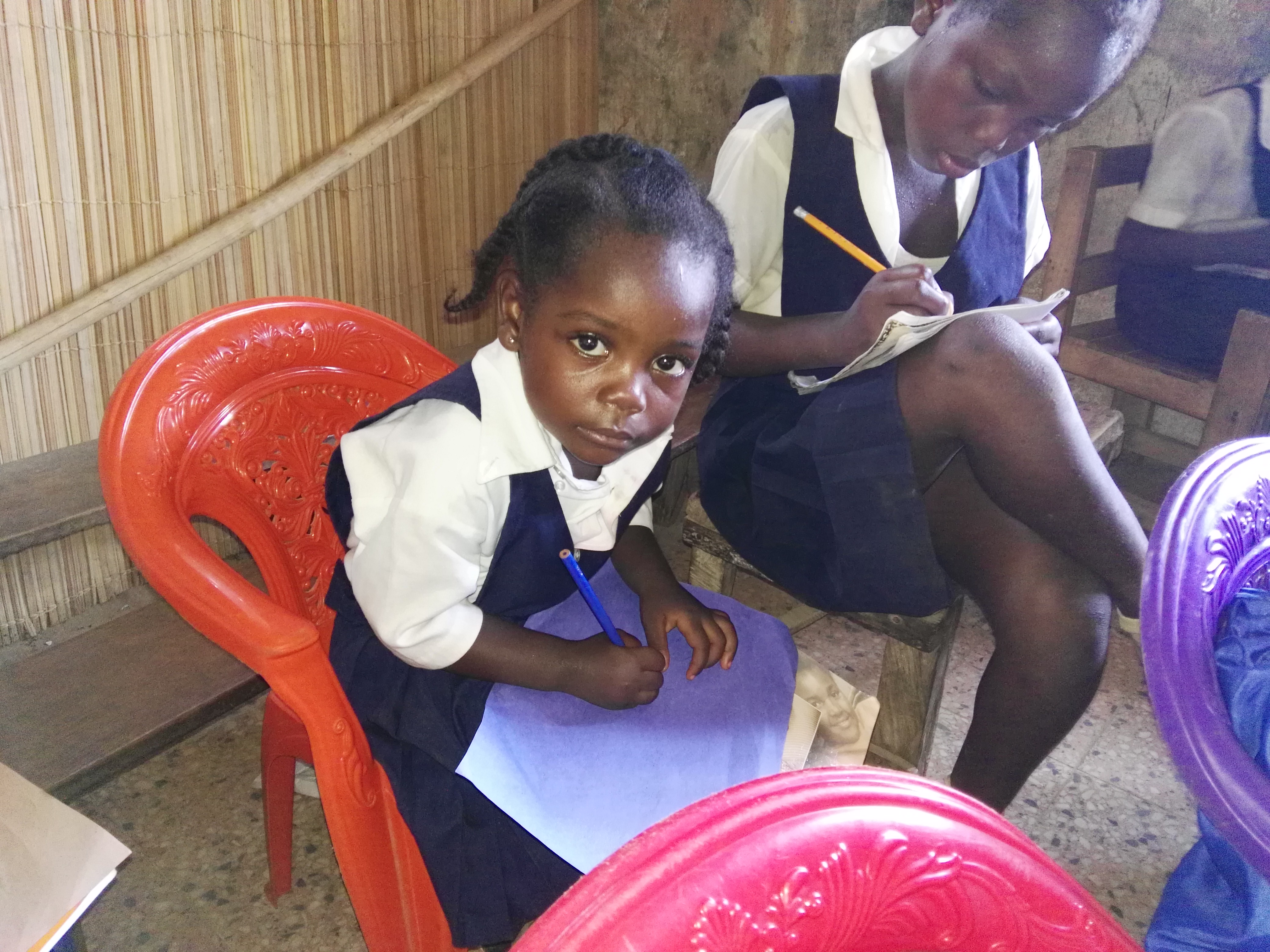 Young girls doing school work 