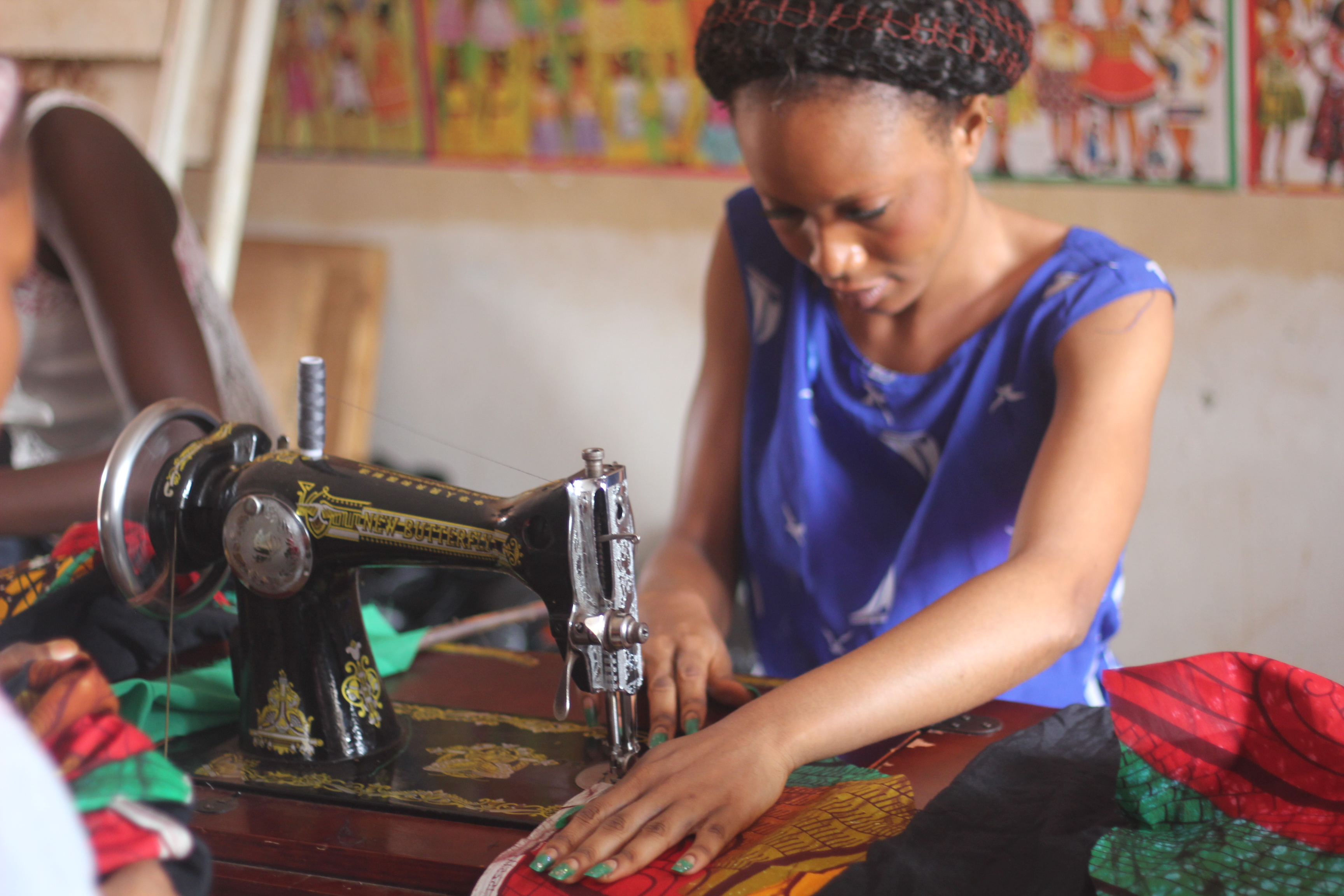 Woman sewing clothes 