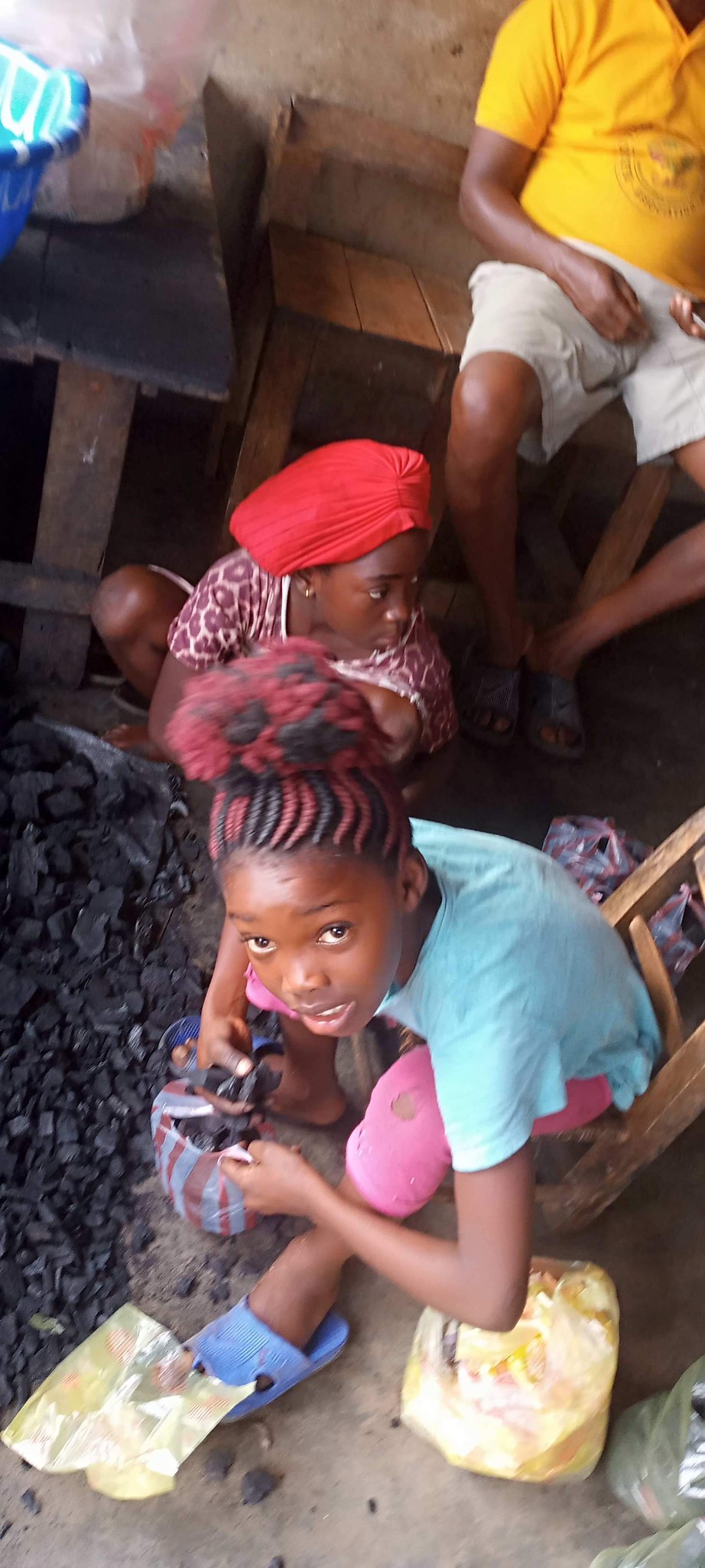Liberia school students doing chores 