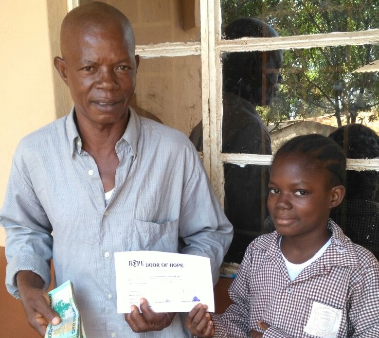 Marian receiving scholarship 