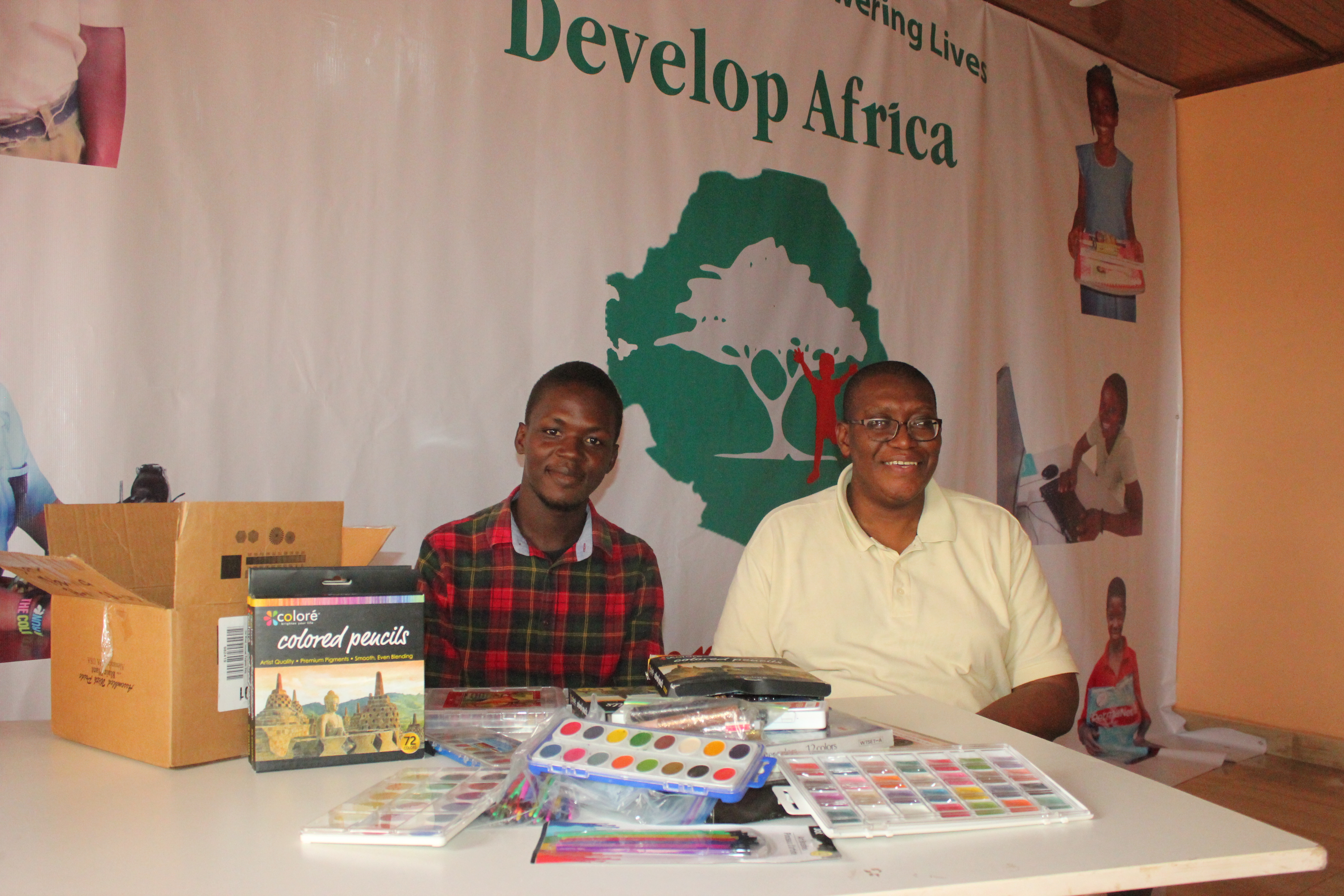 Sylvester and Sahr with art supplies 