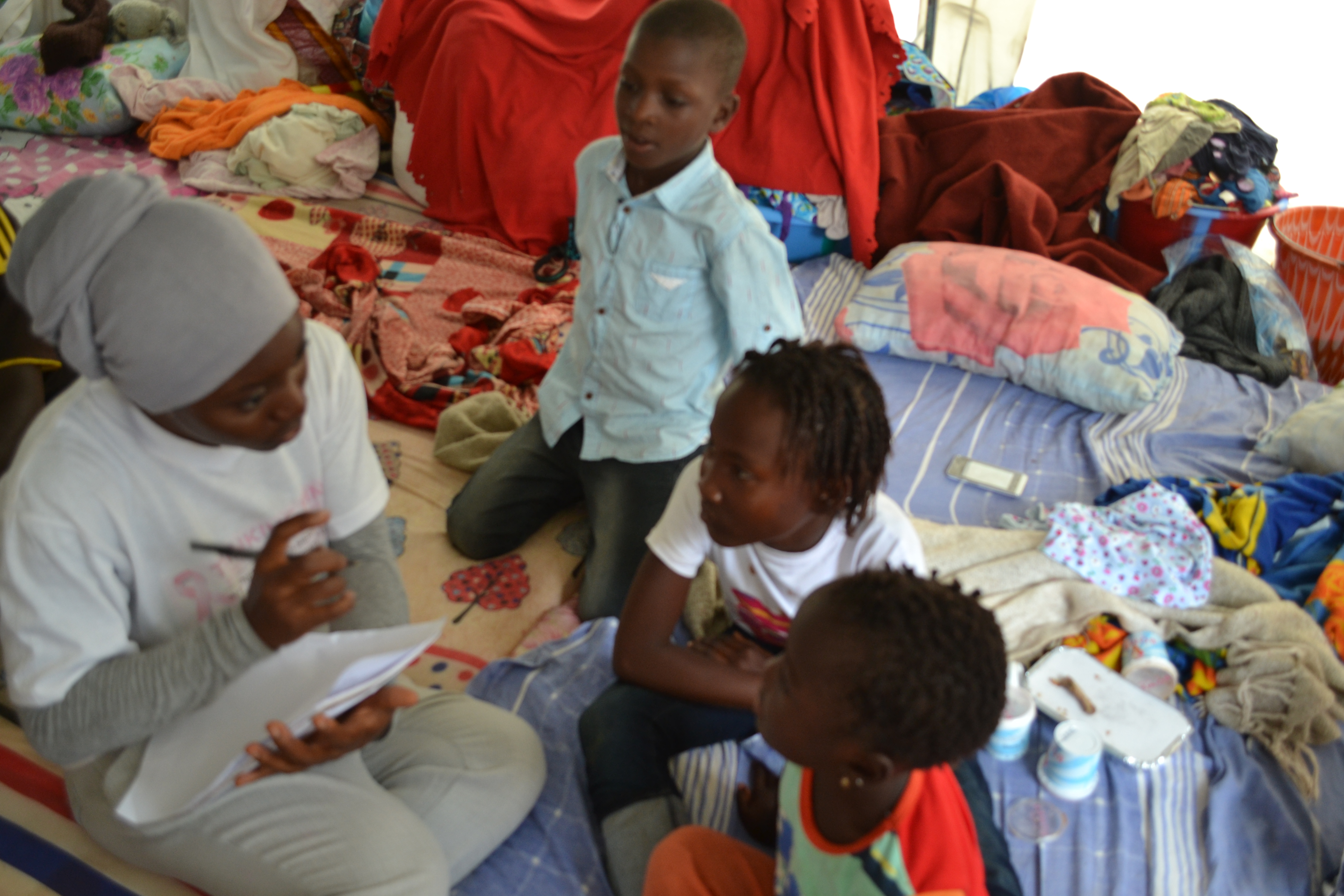 Counseling children in the tent by T.P.B.C.F