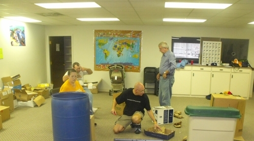 Unicoi UMC Church Members Volunteer - Help Pack Books...