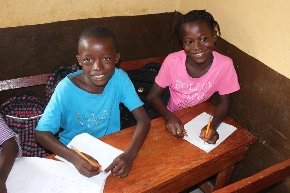 kids in school writing africa