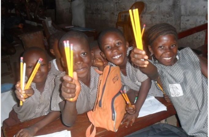 happy kids with pencils