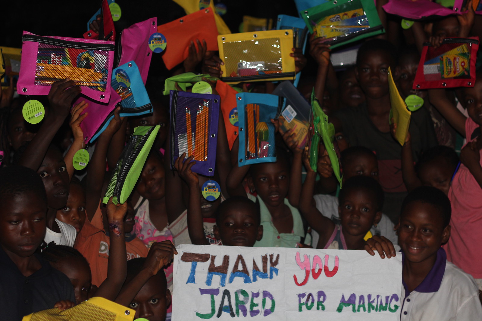 Kids with school supplies 