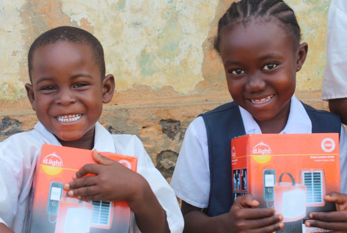 boy and girl with solar lights