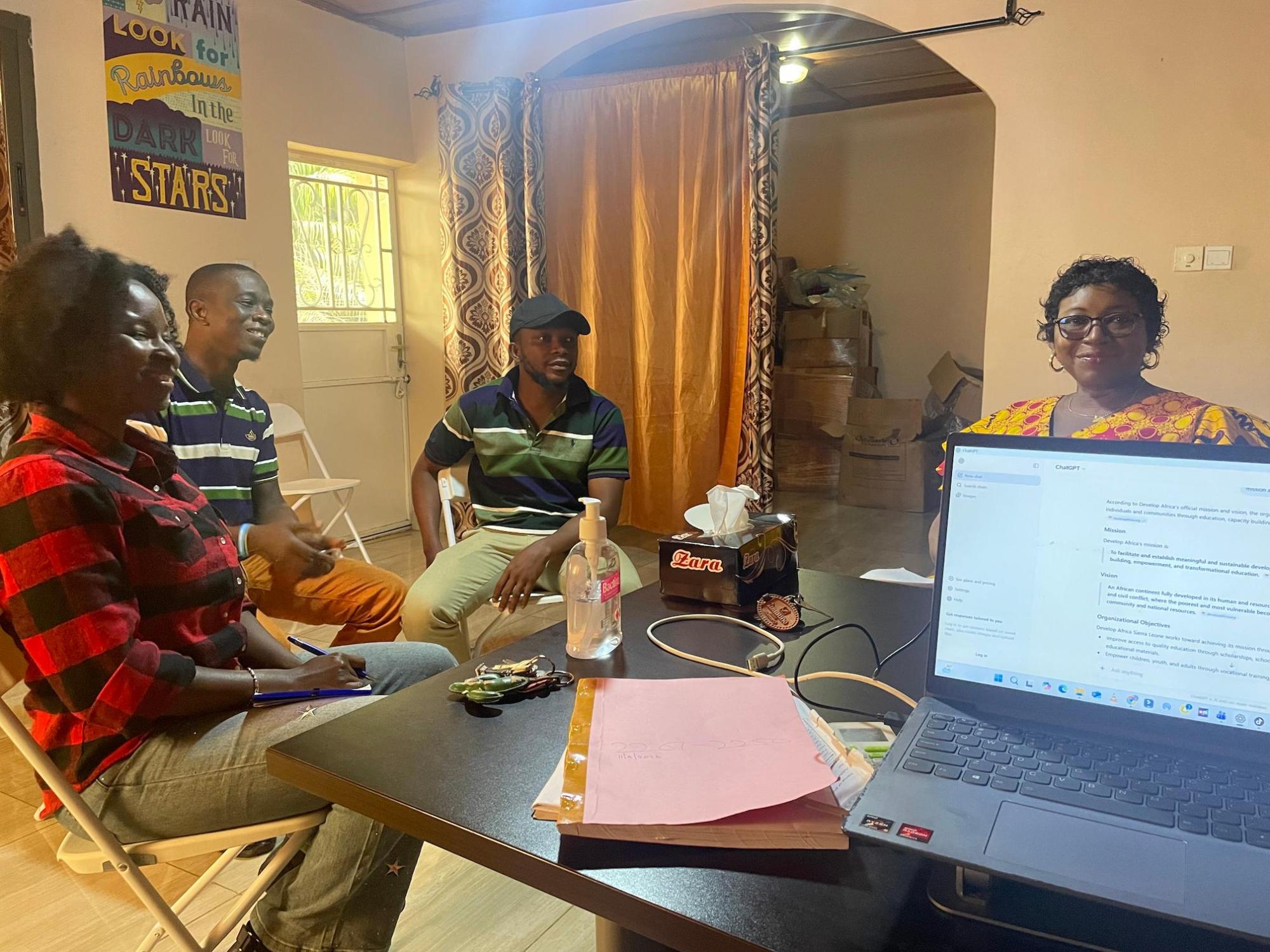 Board member and staff in a meeting Sierra Leone