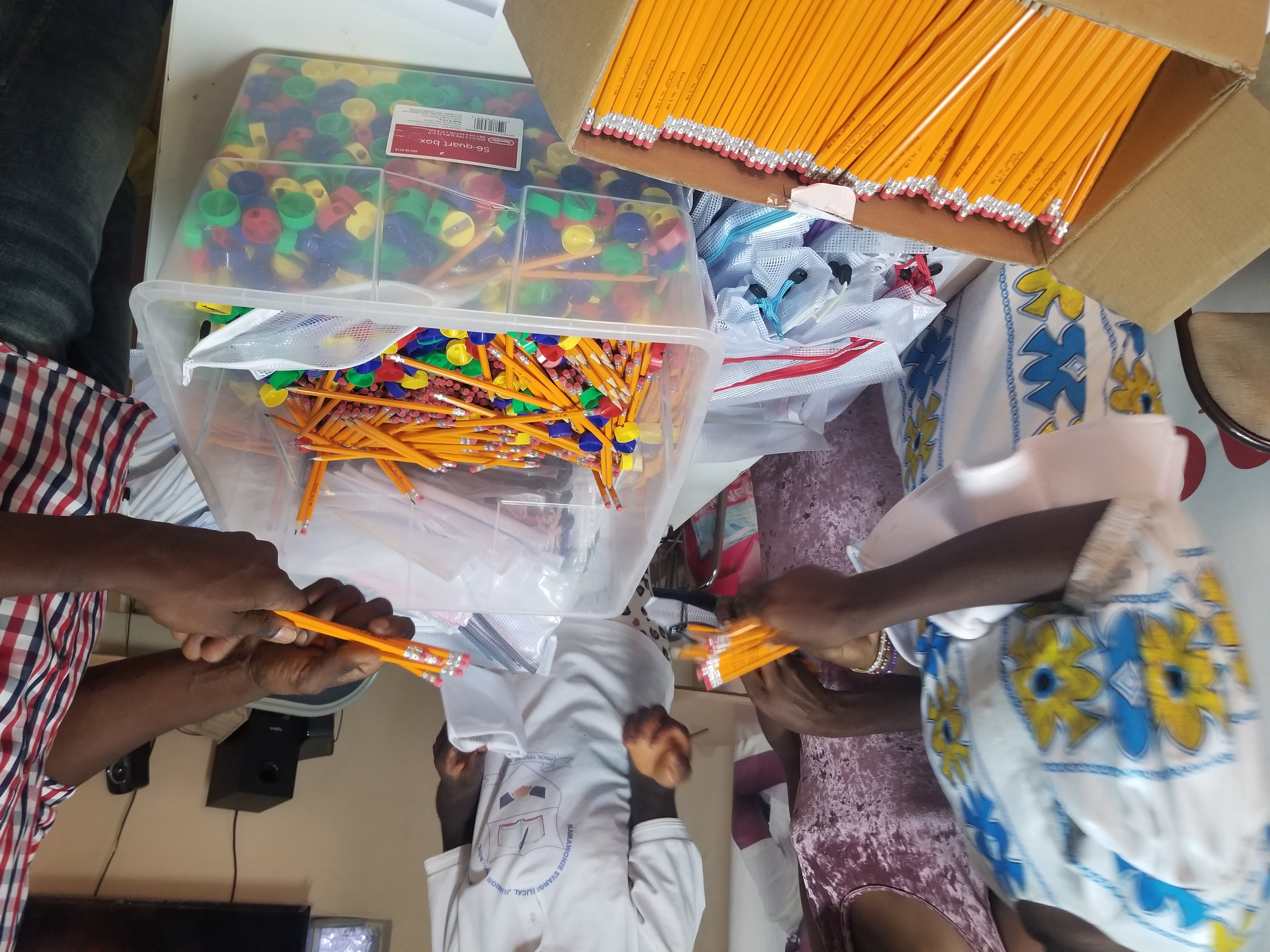 packing pencils into pouches