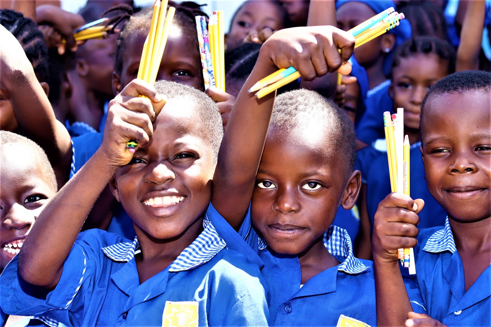 children with pencils