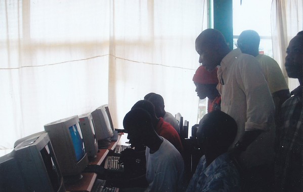 Students during a hands-on session, learning to navigate Word and Excel — their first digital footsteps into a wider world.