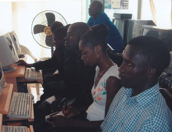 Youths in class learning how to use the computer at Develop Africa in Sierra Leone