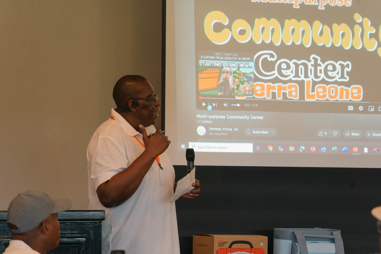 Sylvester giving a presentation at the swing for change 2025