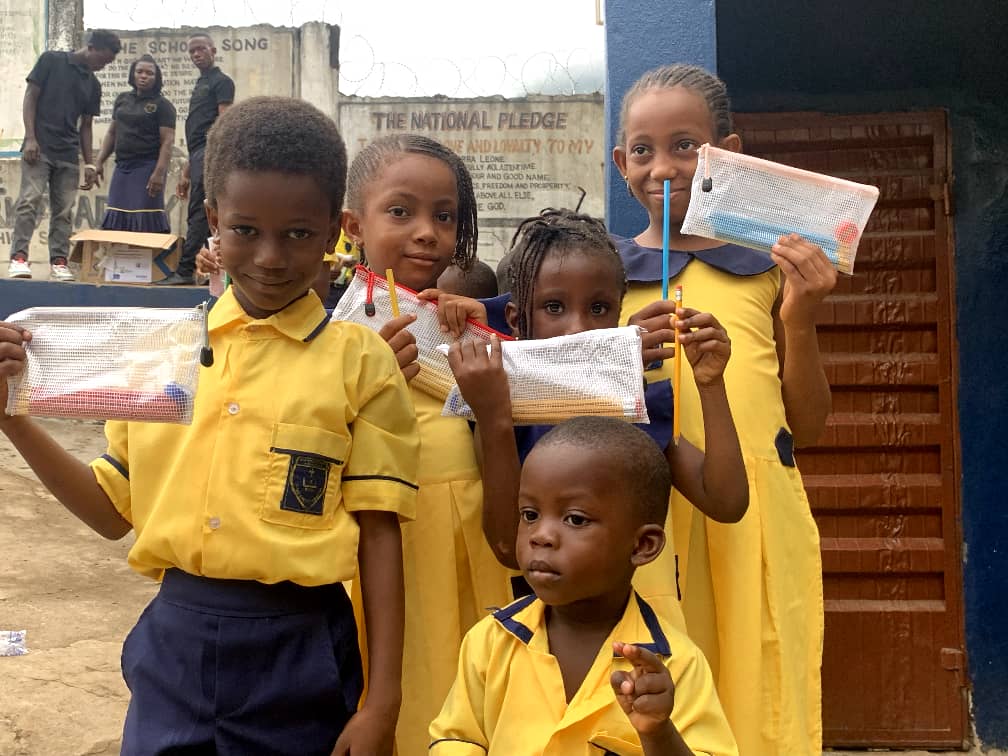 Kids with pencil pouches at the 2025 Year of the Pencil Campaign by Develop Africa