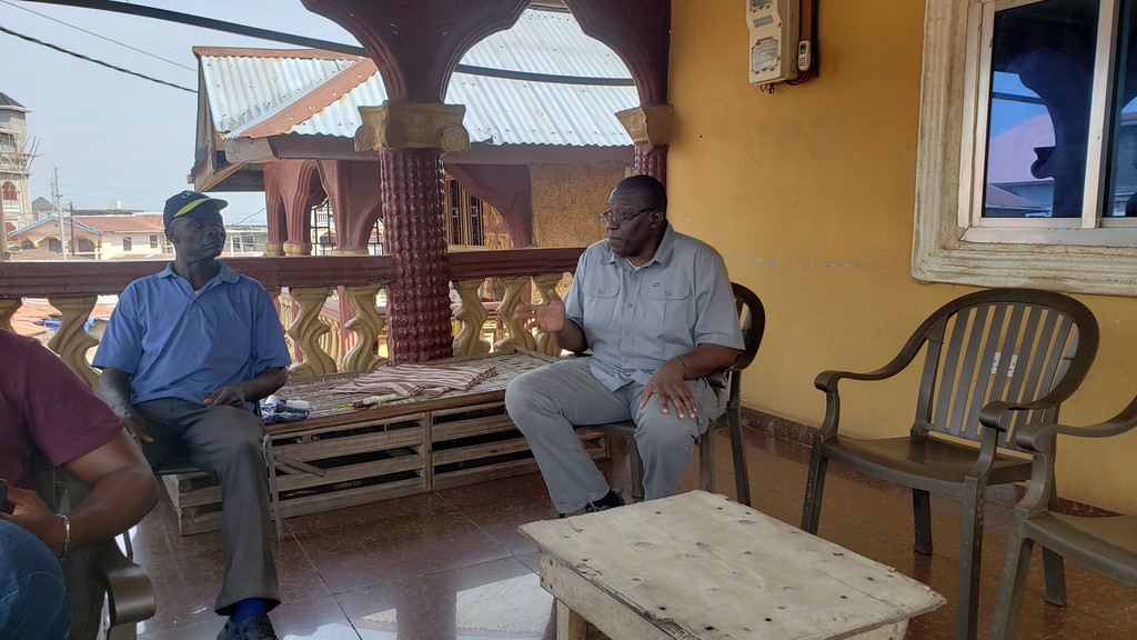 sylvester talking with people at the construction site