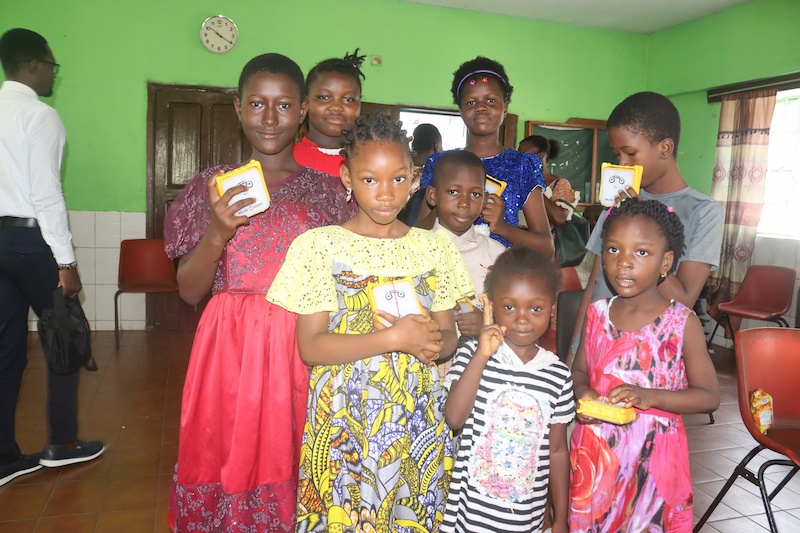 Kids with SolarBuddy lamps in Sierra Leone - July 2026