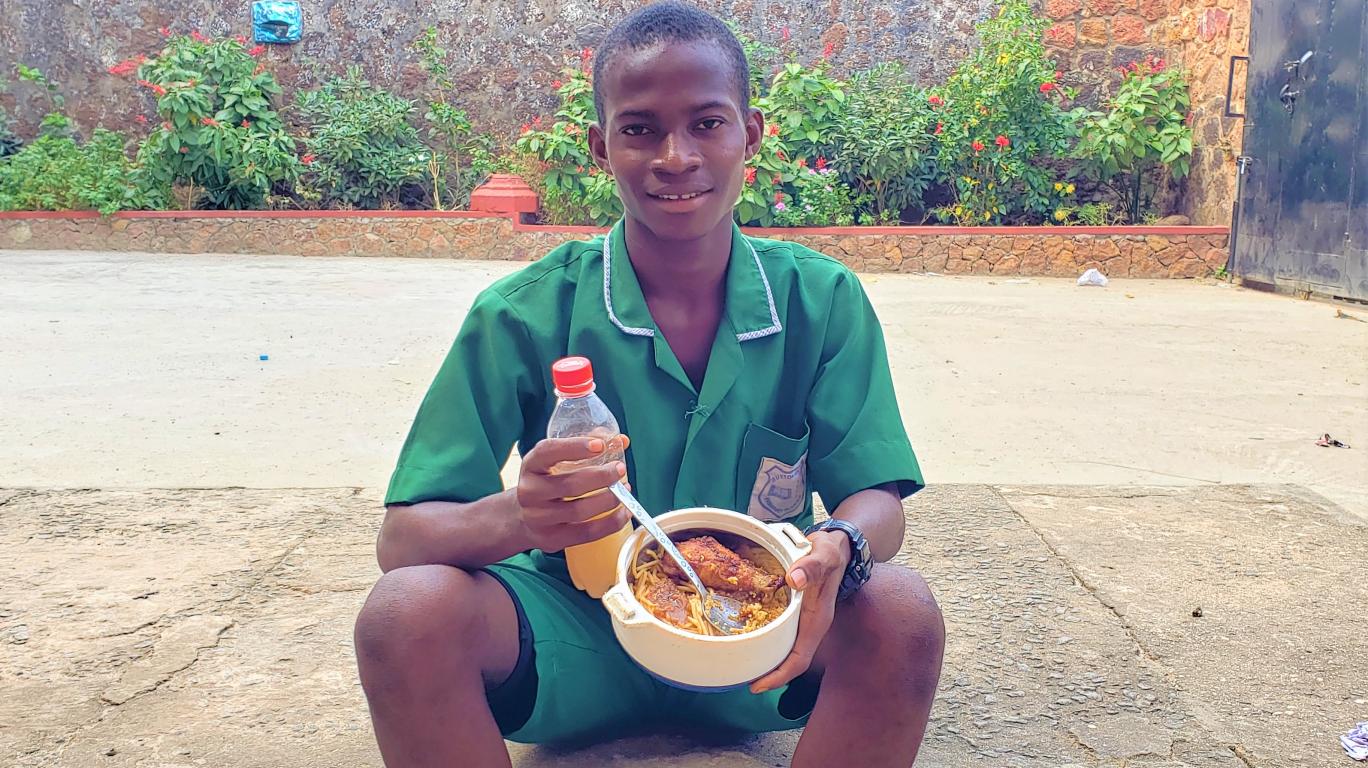 Boy with school lunch