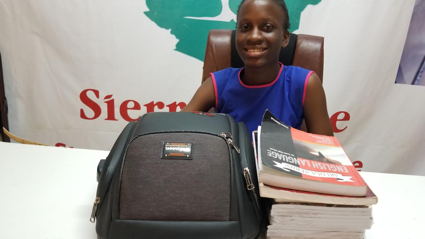 Girl with Exam Preparation Books