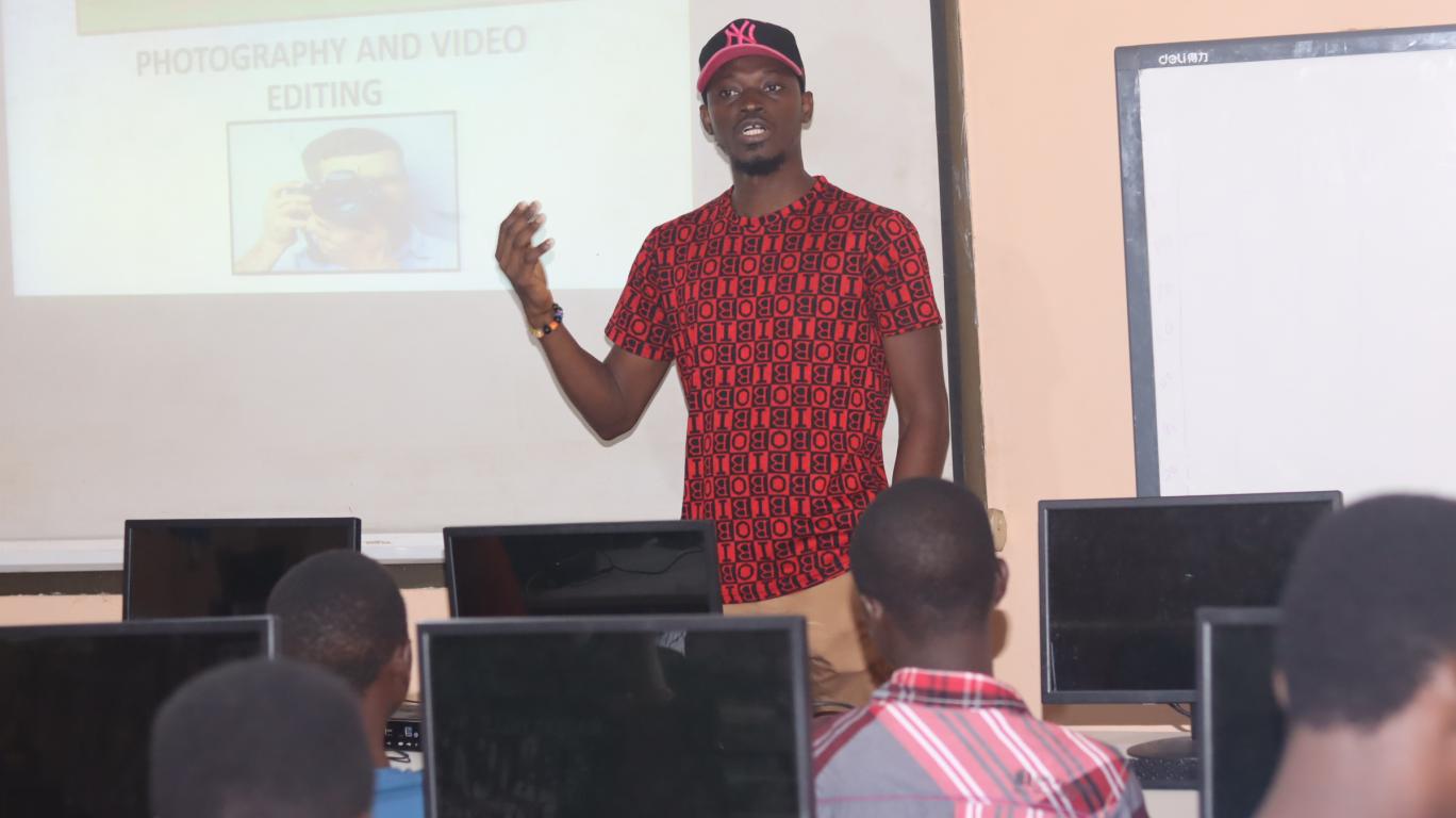 Joseph Teaching the Mentees about Photography