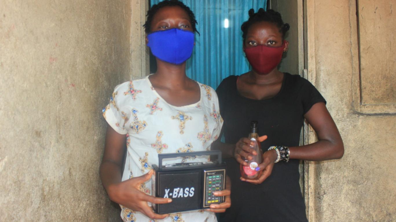 Lucy & Elizabeth with masks and a radio