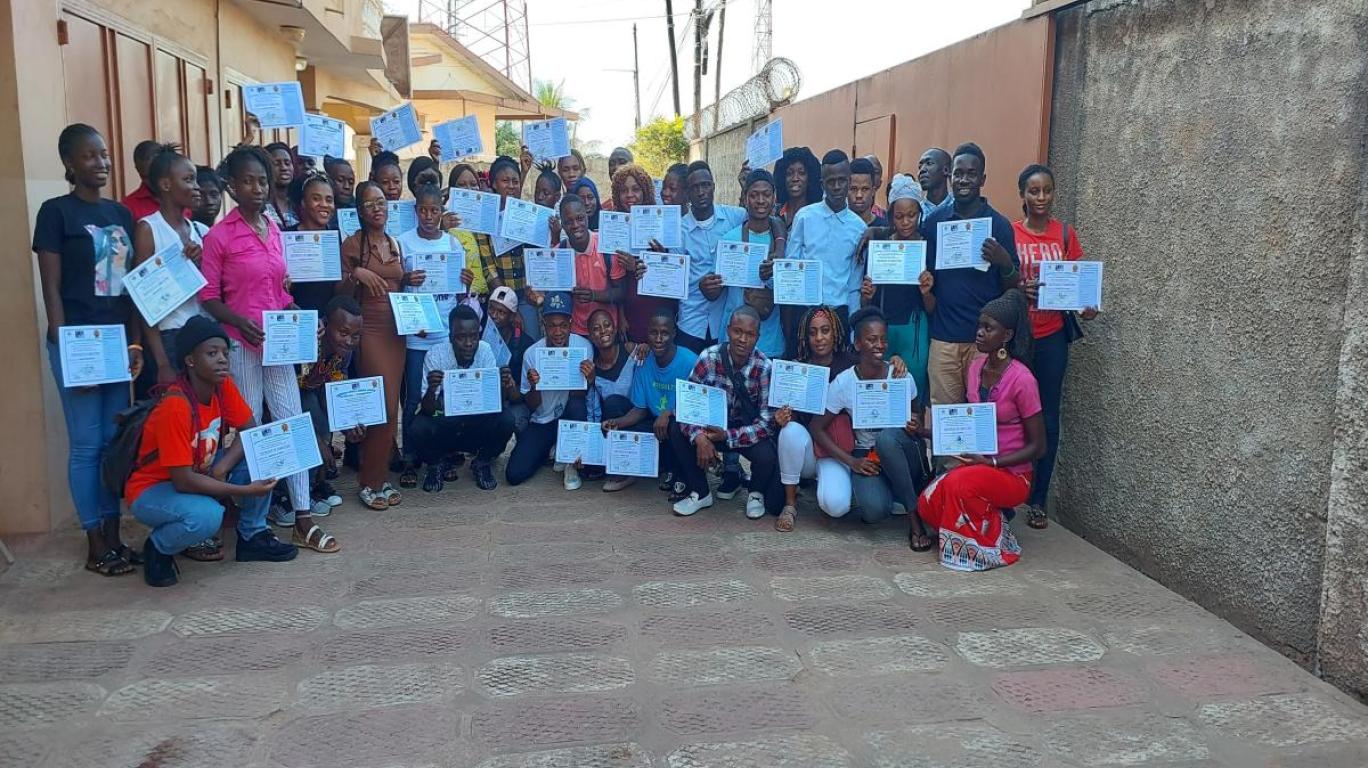 Fifty-nine Computer Students with Certificates of Completion
