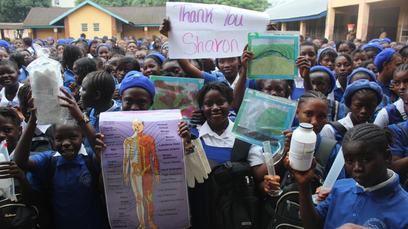 Freetown Secondary School For Girls Hold Sign of Thanks to Sharon