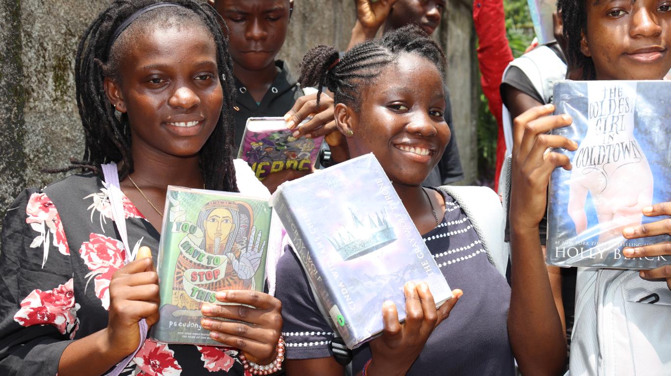 Students with their new books