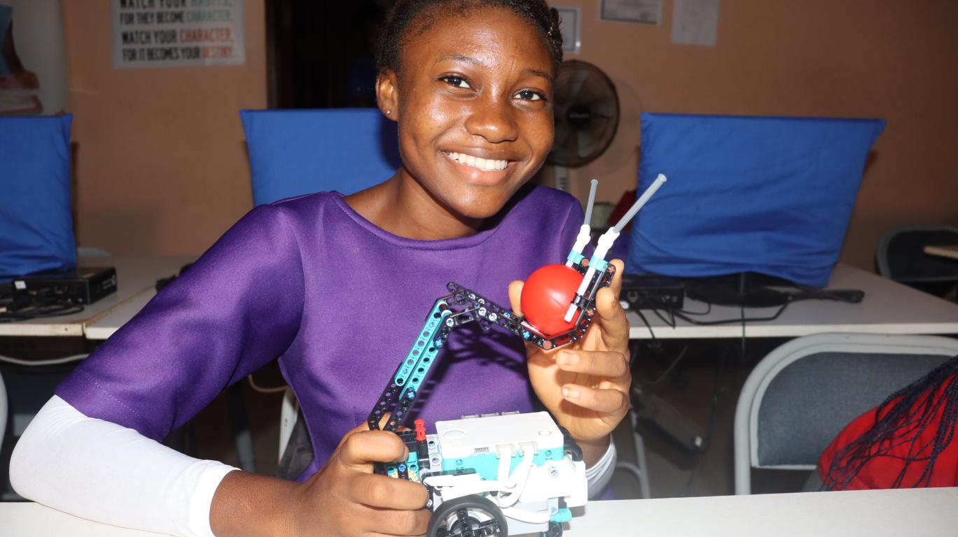 Girl with Robot Created Lego STEM Session