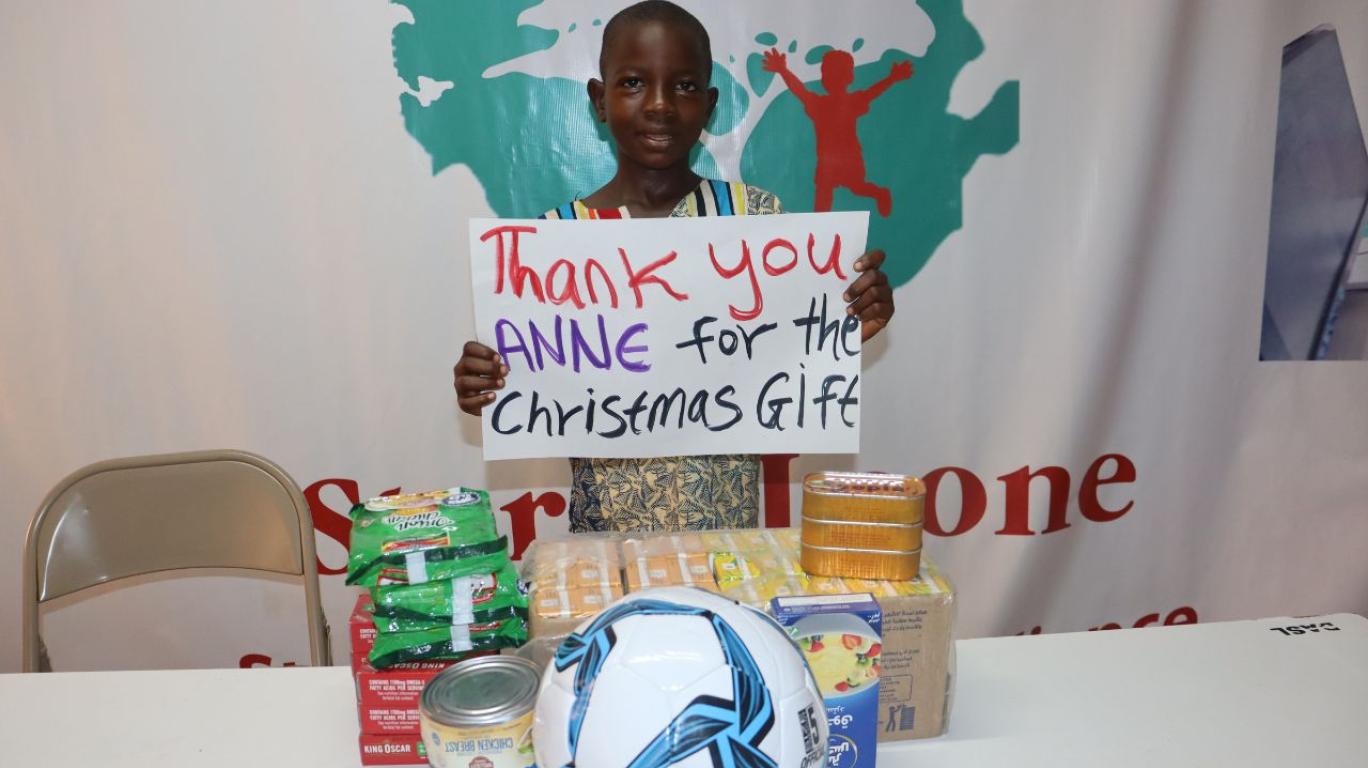 Joshua with a Christmas Gift