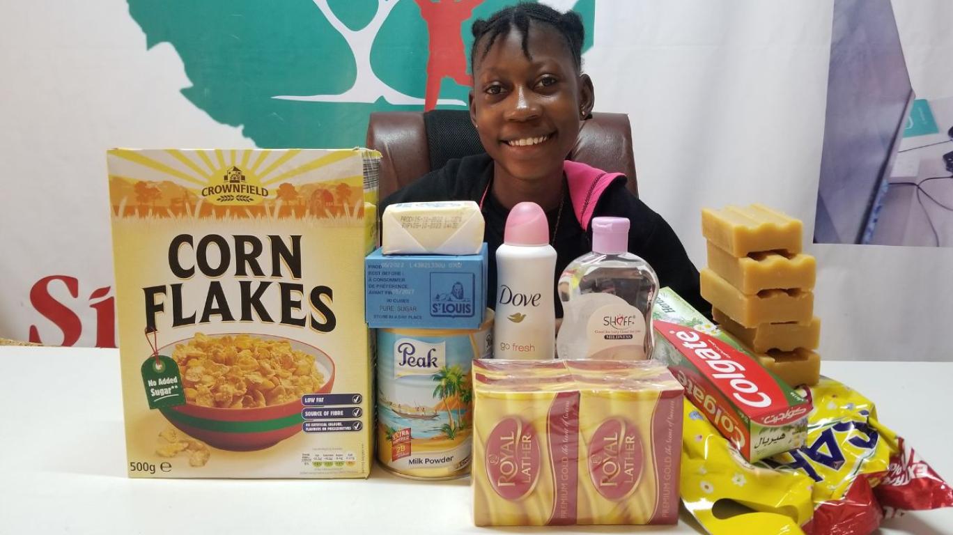 Joy with food & toiletries from her sponsor