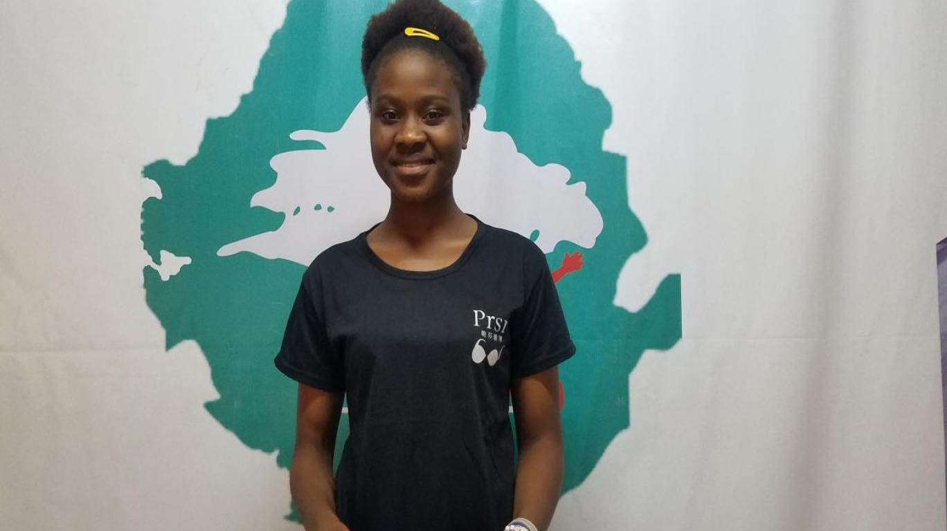 Mariama receiving tuition for college