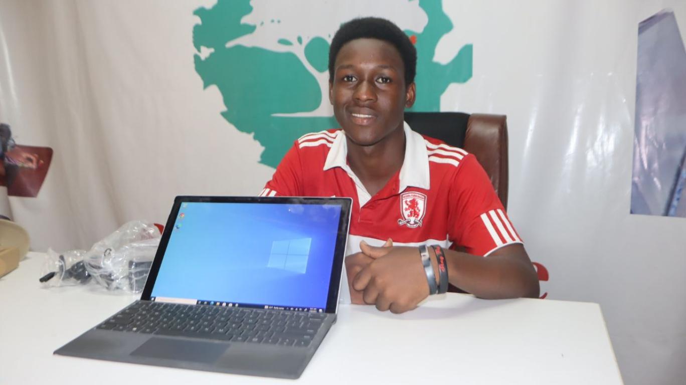 Mattia with a Laptop for school