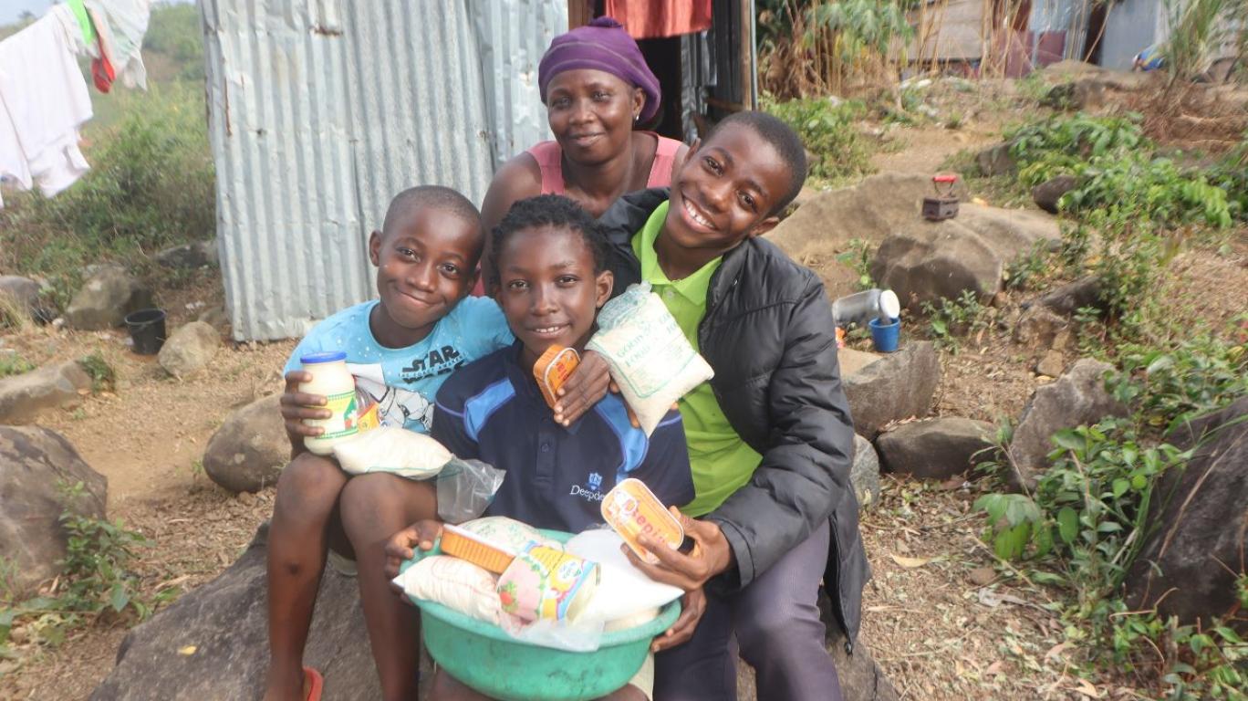 Osman, Alfred, Abdul & their mom with food support