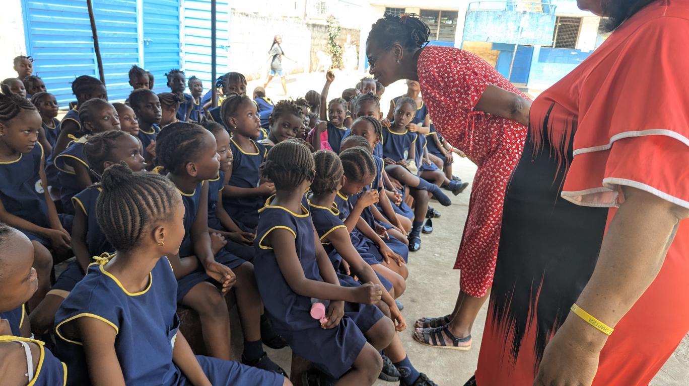 Sharon talking to the FAWE Students during her visit