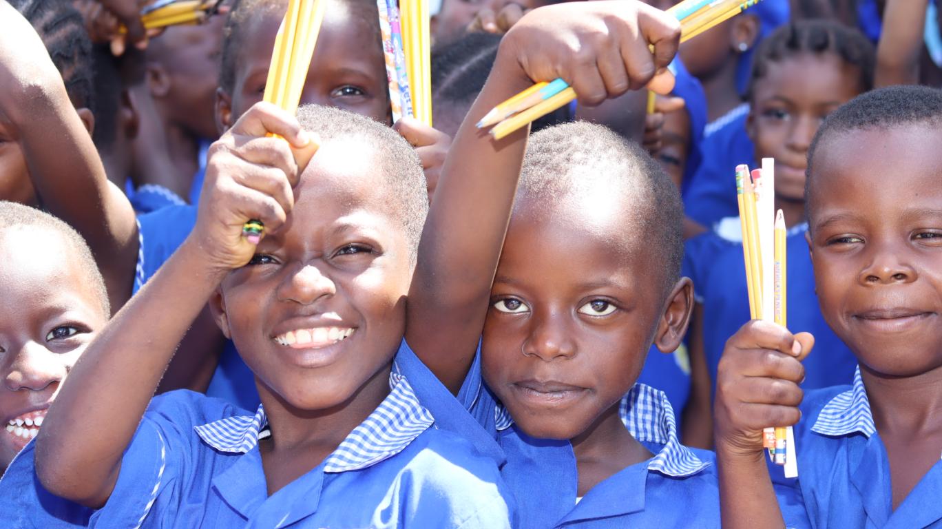 Students with their new pencils