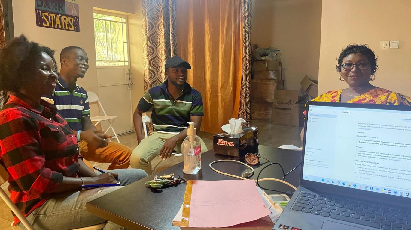 Board member and staff in a meeting Sierra Leone