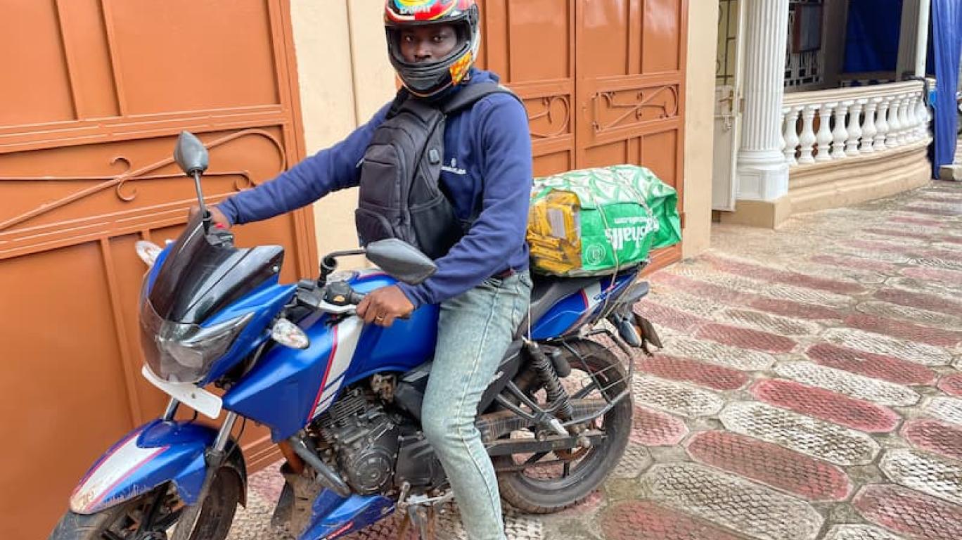 Joseph - Staff Develop Africa, on a bike - July 2026