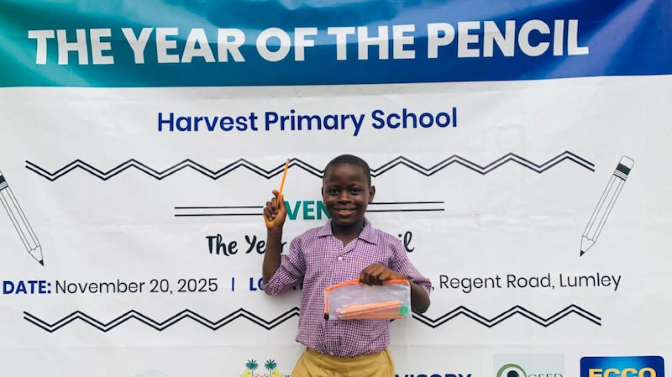 A Kid With Pencil Pouch At The Develop Africa 2025 Year Of The Pencil Campaign - Sierra Leone