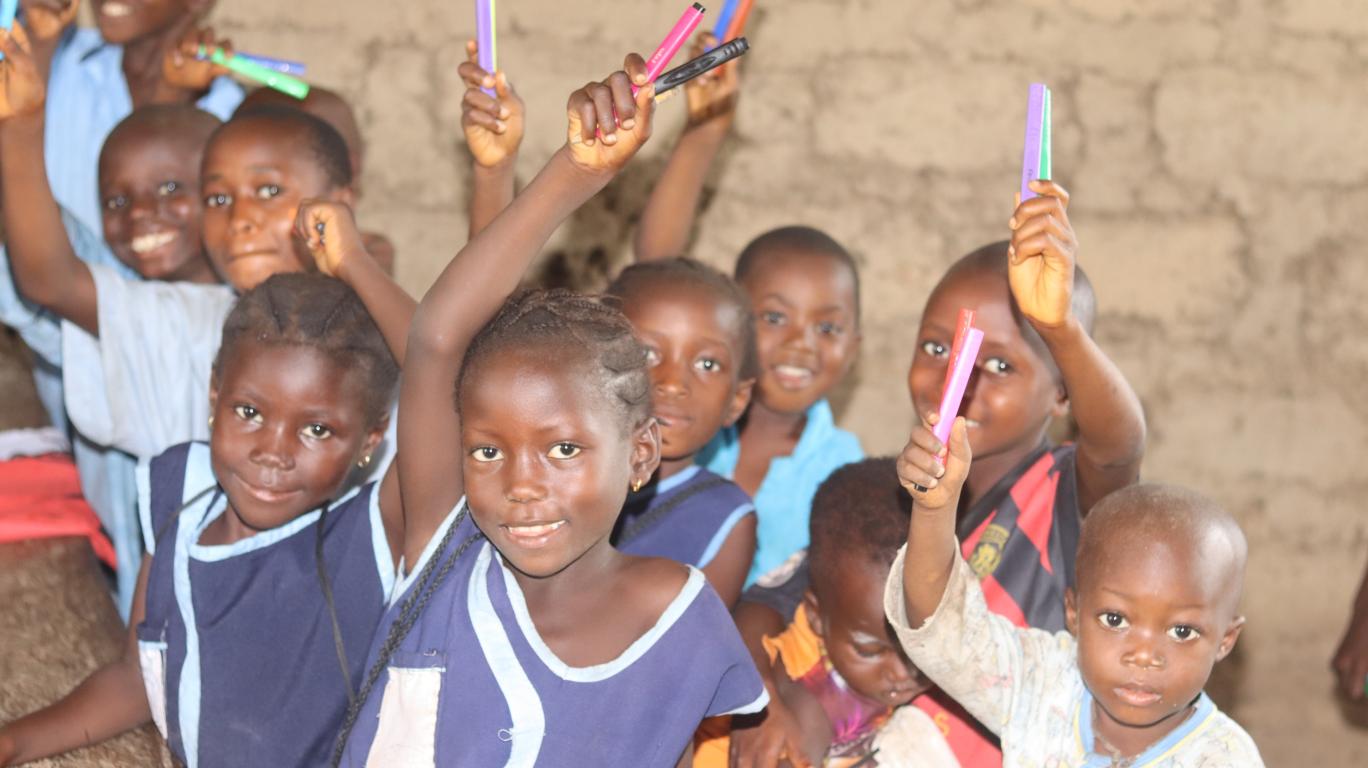 Students with their new pencils