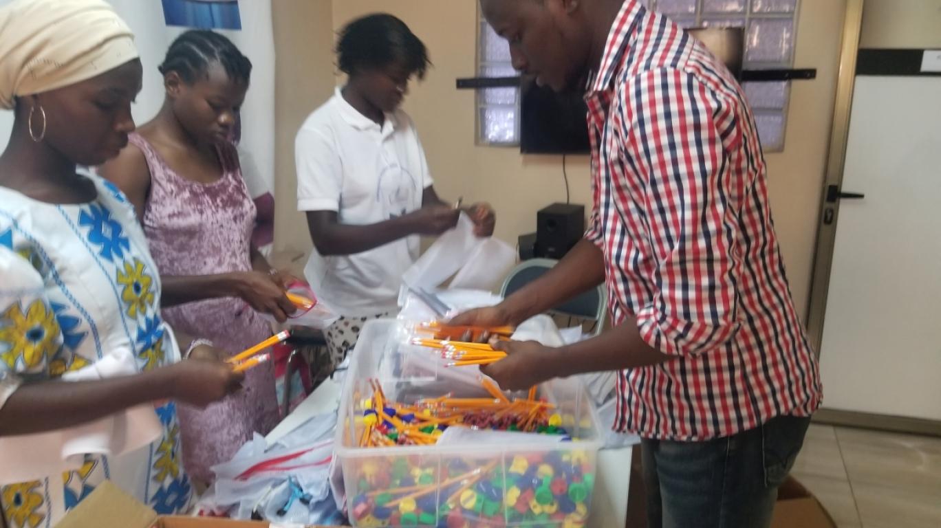 Volunteers packing pencils for the Year of the Pencil Campaign