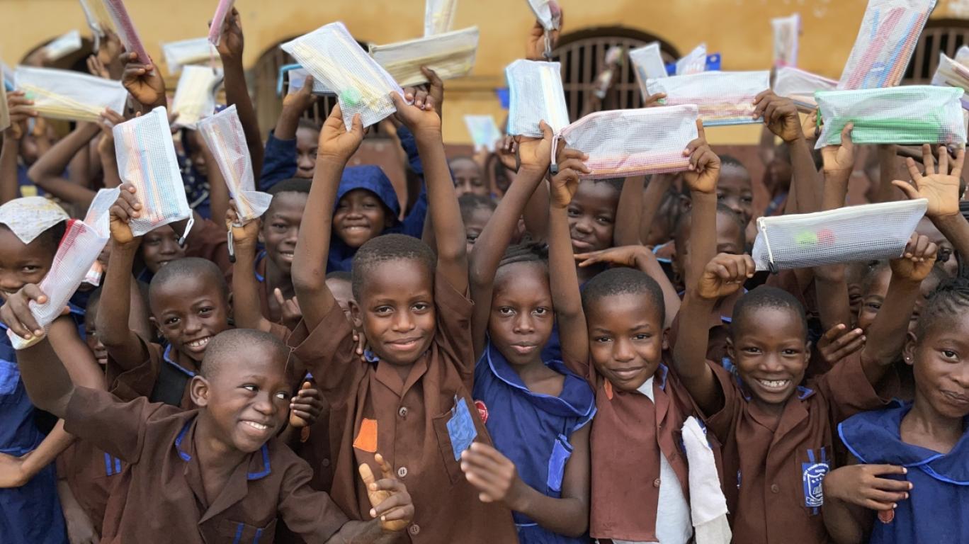 Students with pencils at a school in Sierra Leone