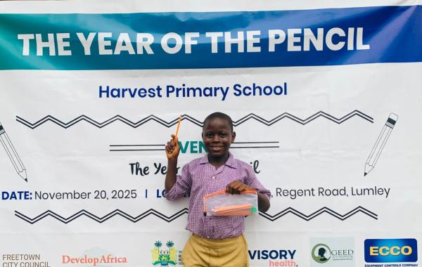 A happy kid with his pencil pouch