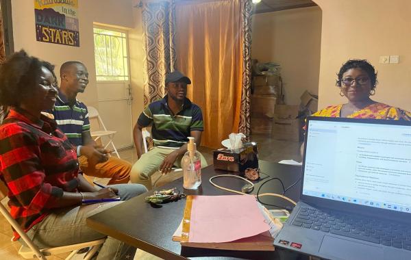 Board member and staff in a meeting Sierra Leone