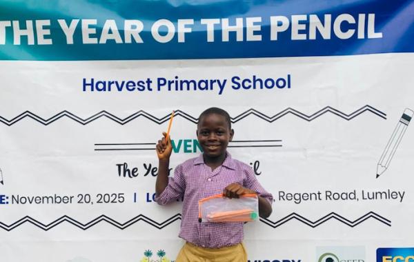 A Kid With Pencil Pouch At The Develop Africa 2025 Year Of The Pencil Campaign - Sierra Leone