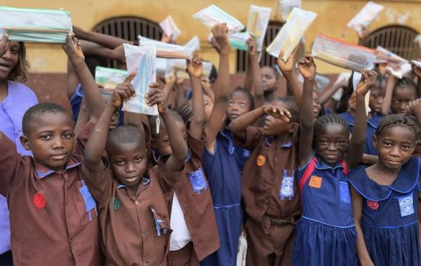 Kids With Pencil Pouches At The Develop Africa 2025 Year Of The Pencil Campaign - Sierra Leone