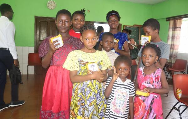 Kids with SolarBuddy Lamp at The Assembly of God Church - Sierra Leone, July 2026